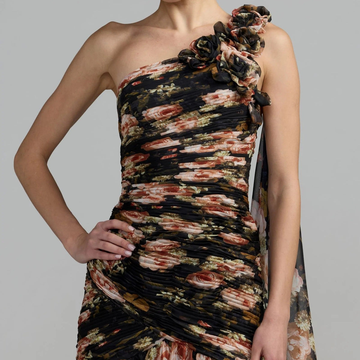 One shoulder gown with dimensional pleats